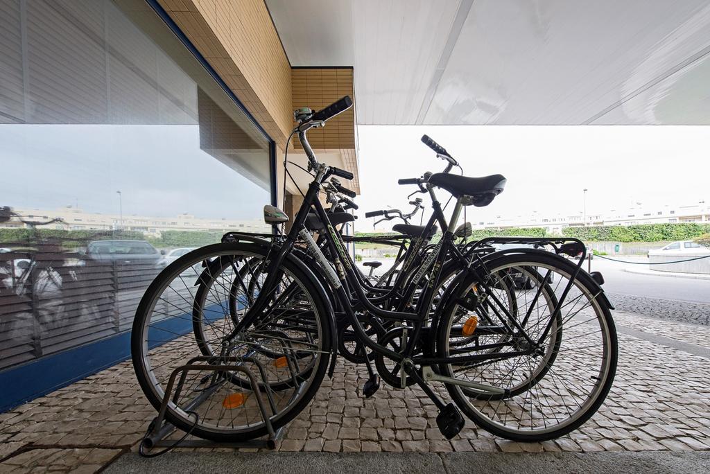Hotel Solverde Spa And Wellness Center Вила-Нова-ди-Гая Экстерьер фото Bicycle parking at the station